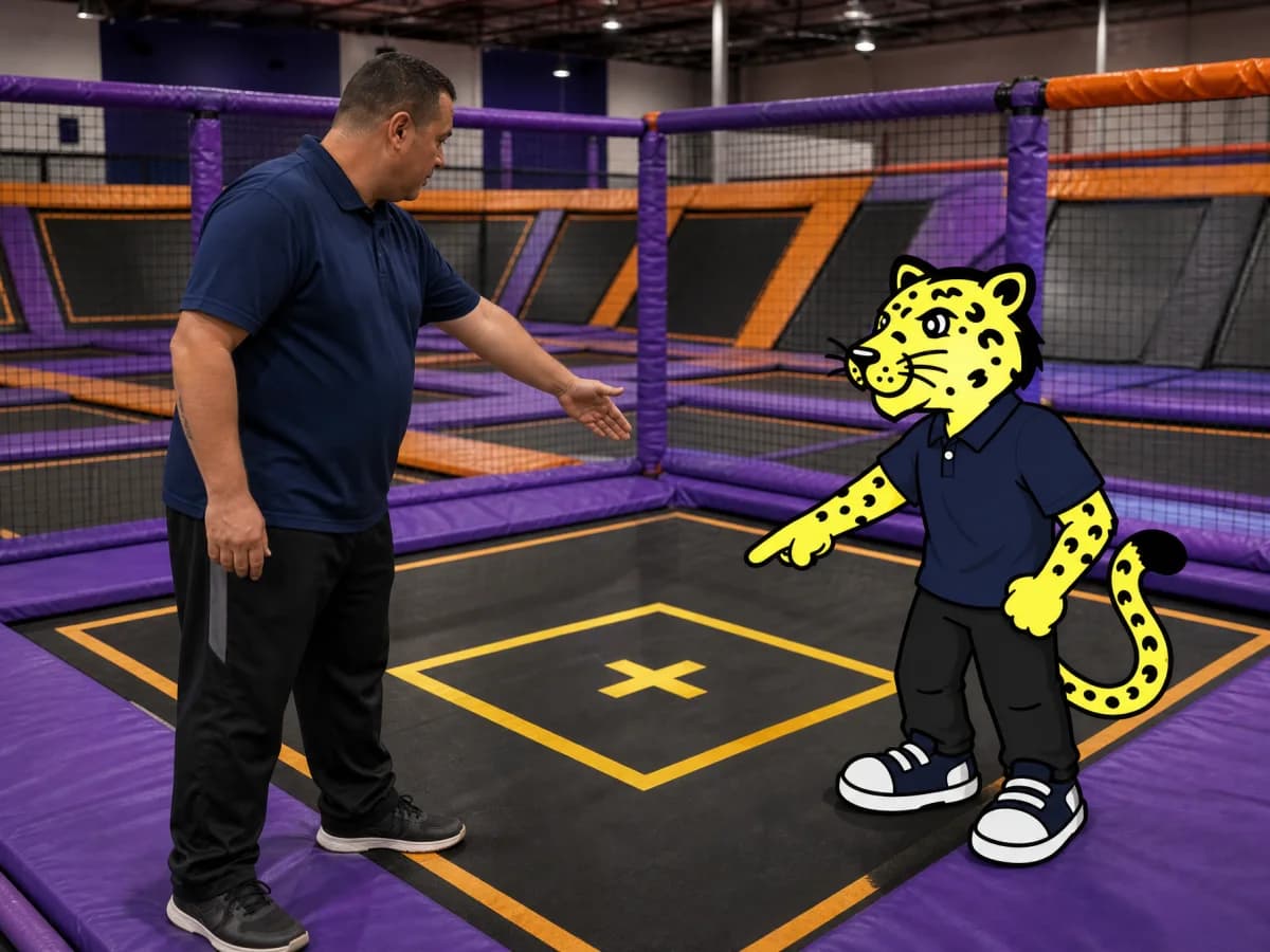 Activity center attendant checking trampoline safety while Leo helps supervise
